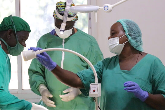 Medical personnel conducting surgery