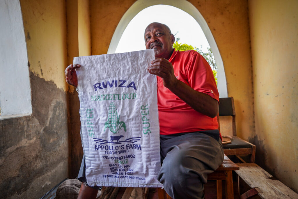 Randan farmer showing his storage bags.