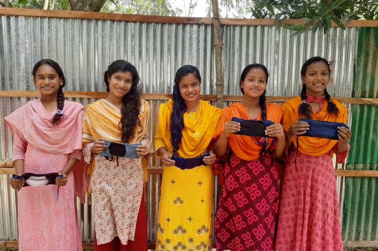 five young women showing and promoting the ELLA pad, which stands for eco-friendly low-cost liquid absorbent sanitary pad