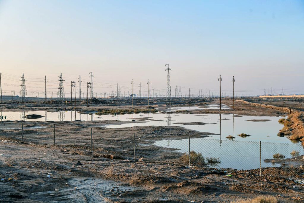 Ponds of polluted water next to an oil refinery in Basra, Iraq.