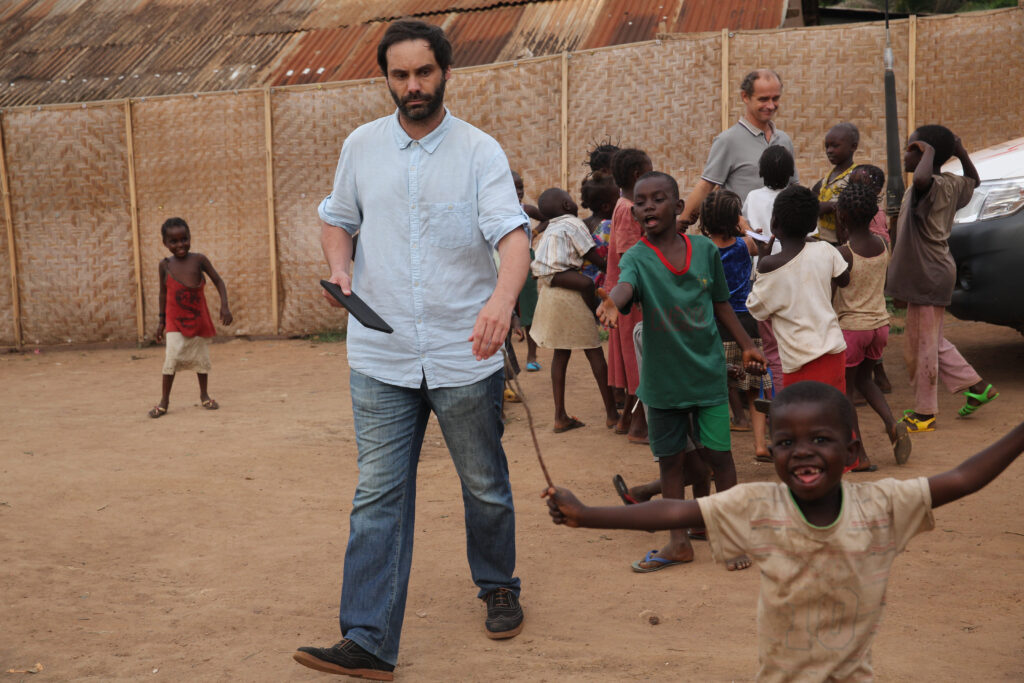 Aid worker and children in the Central African Republic