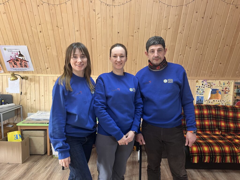 Three staff members of Caritas Ukraine.