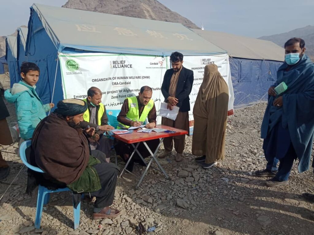 Aid workers in a Pakistani refugee camp.