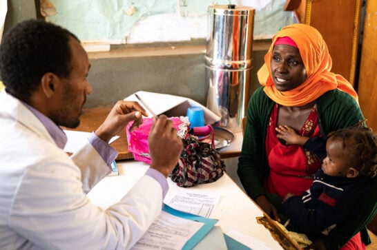 A doctor and a patient in a health centre in Ethiopia.