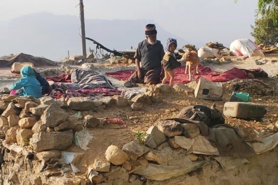 A Yemeni family on the roof of their home.